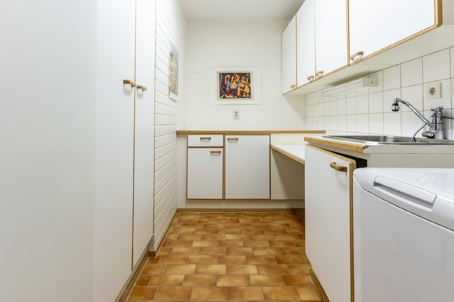 Kodinhoitohuone alakerrassa