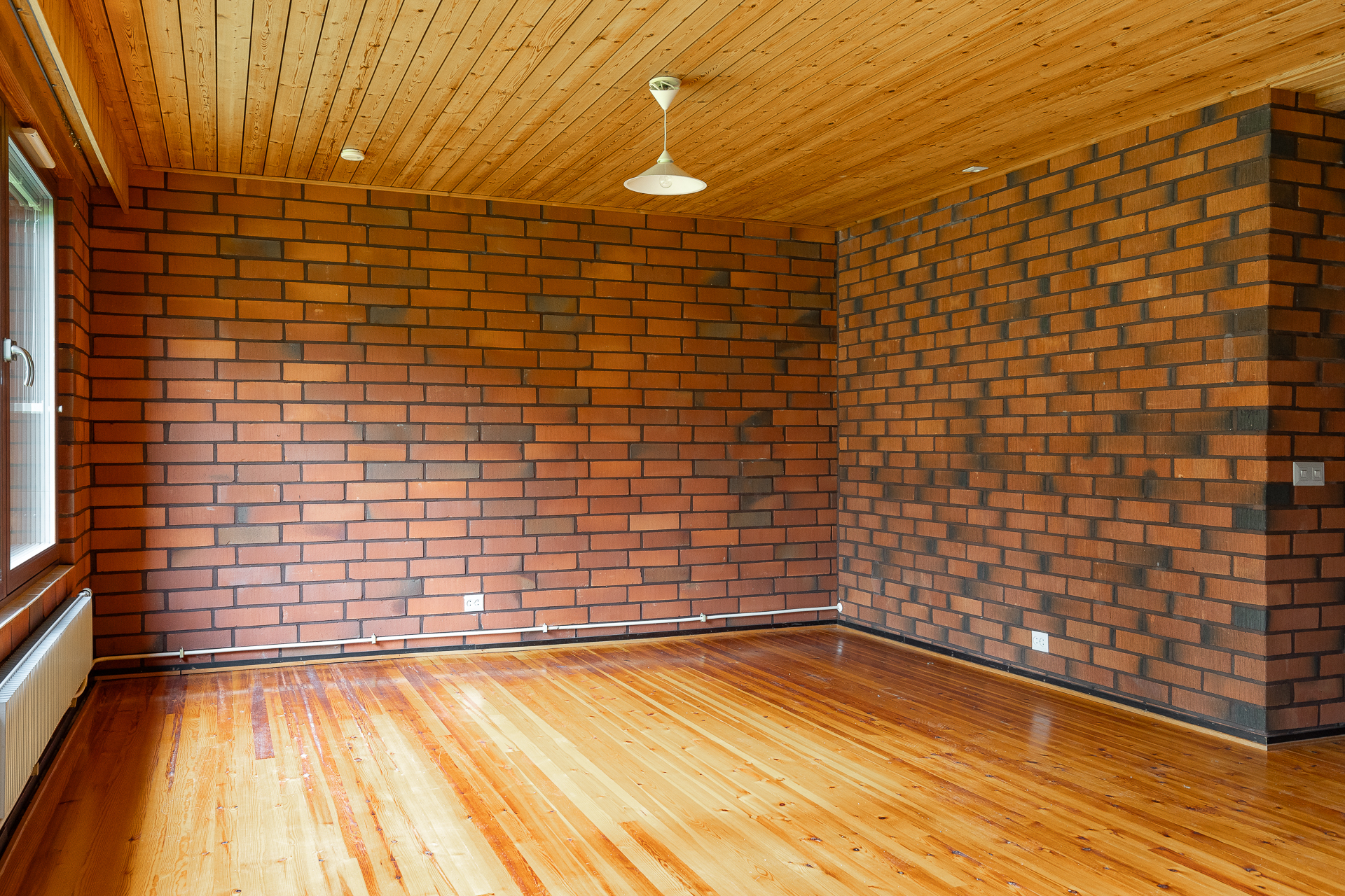 Olohuone, johon voi suunnitella takkaa