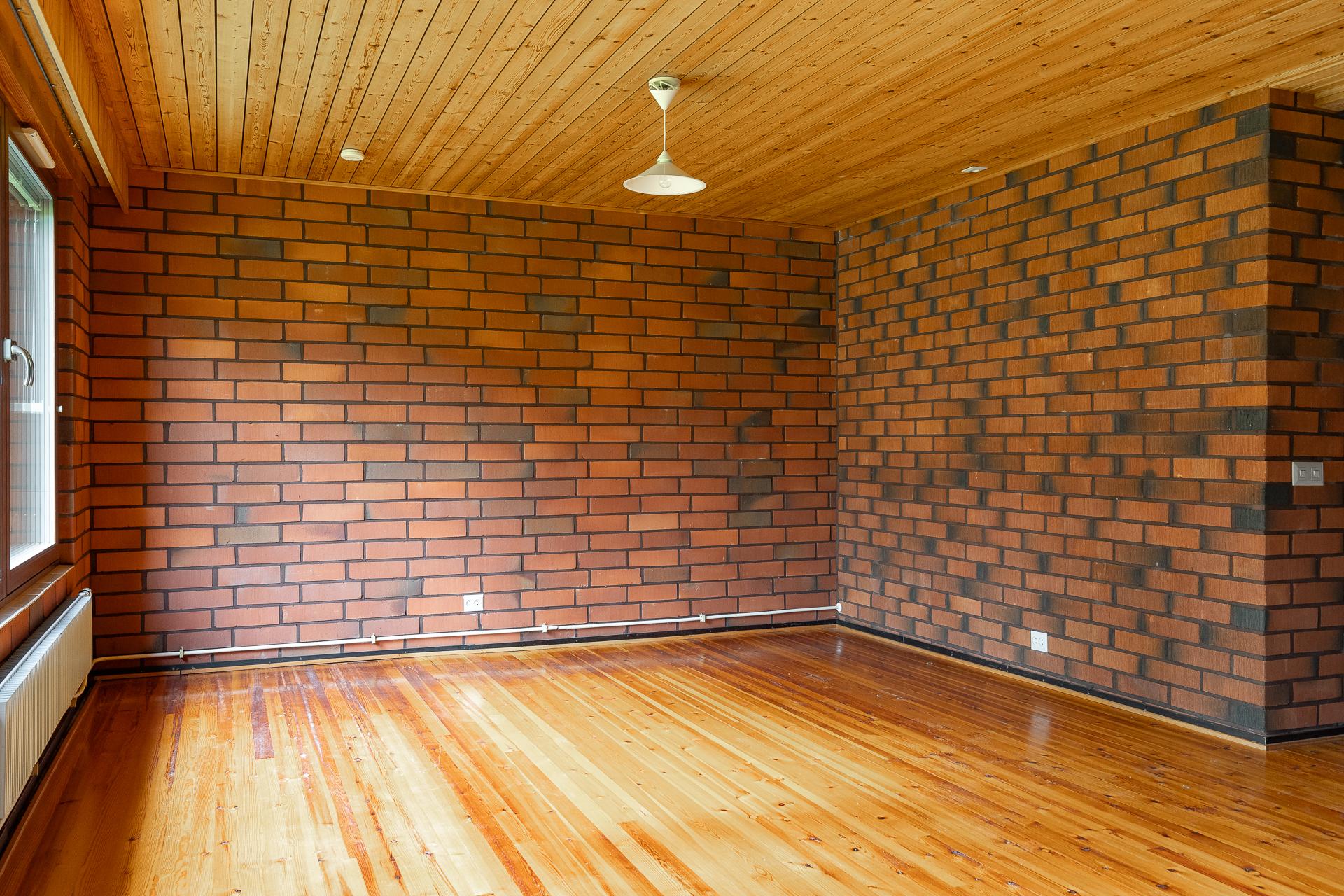 Olohuone, johon voi suunnitella takkaa