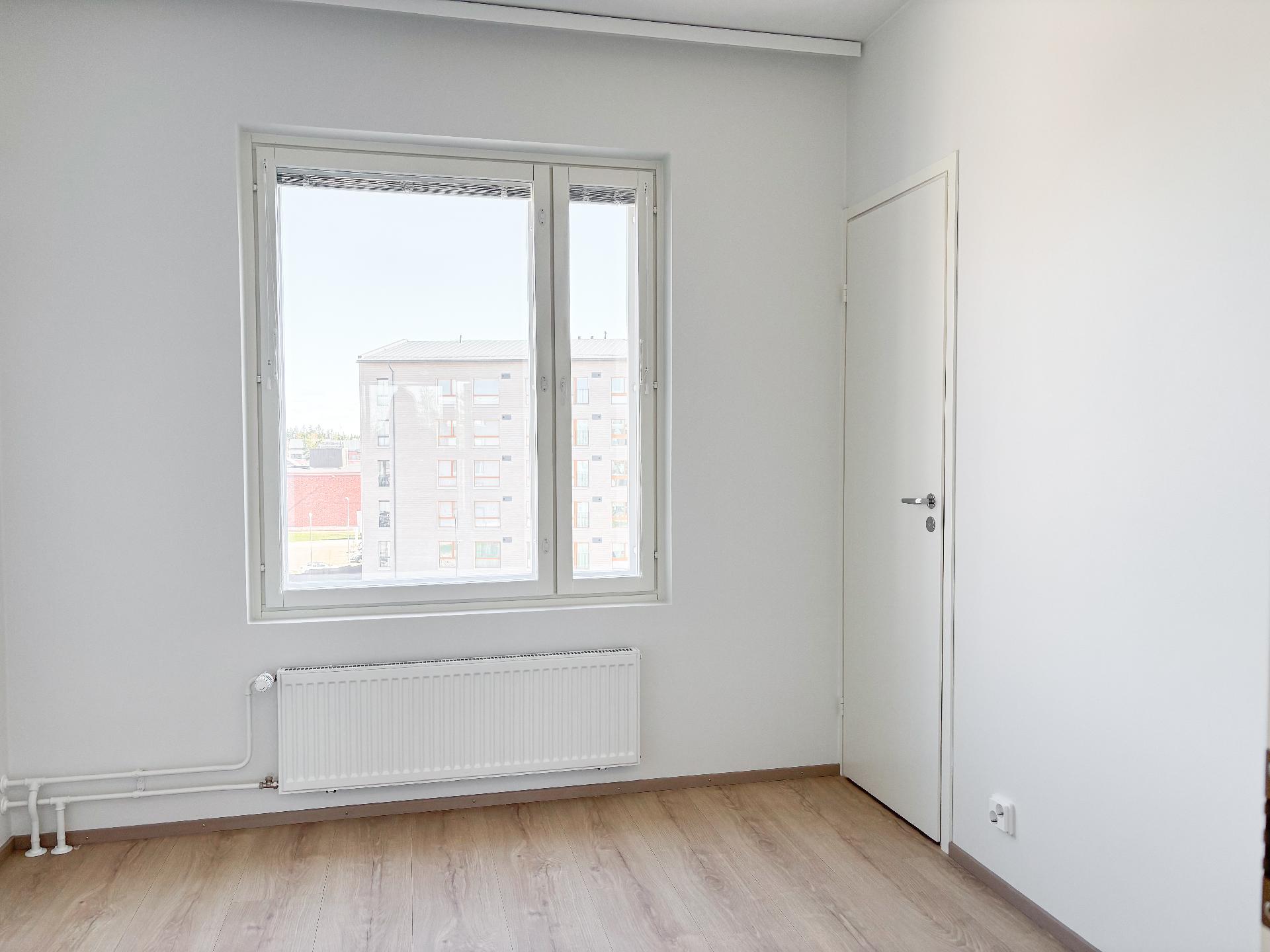 Makuuhuone 2, jonka yhteydessä vaatehuone