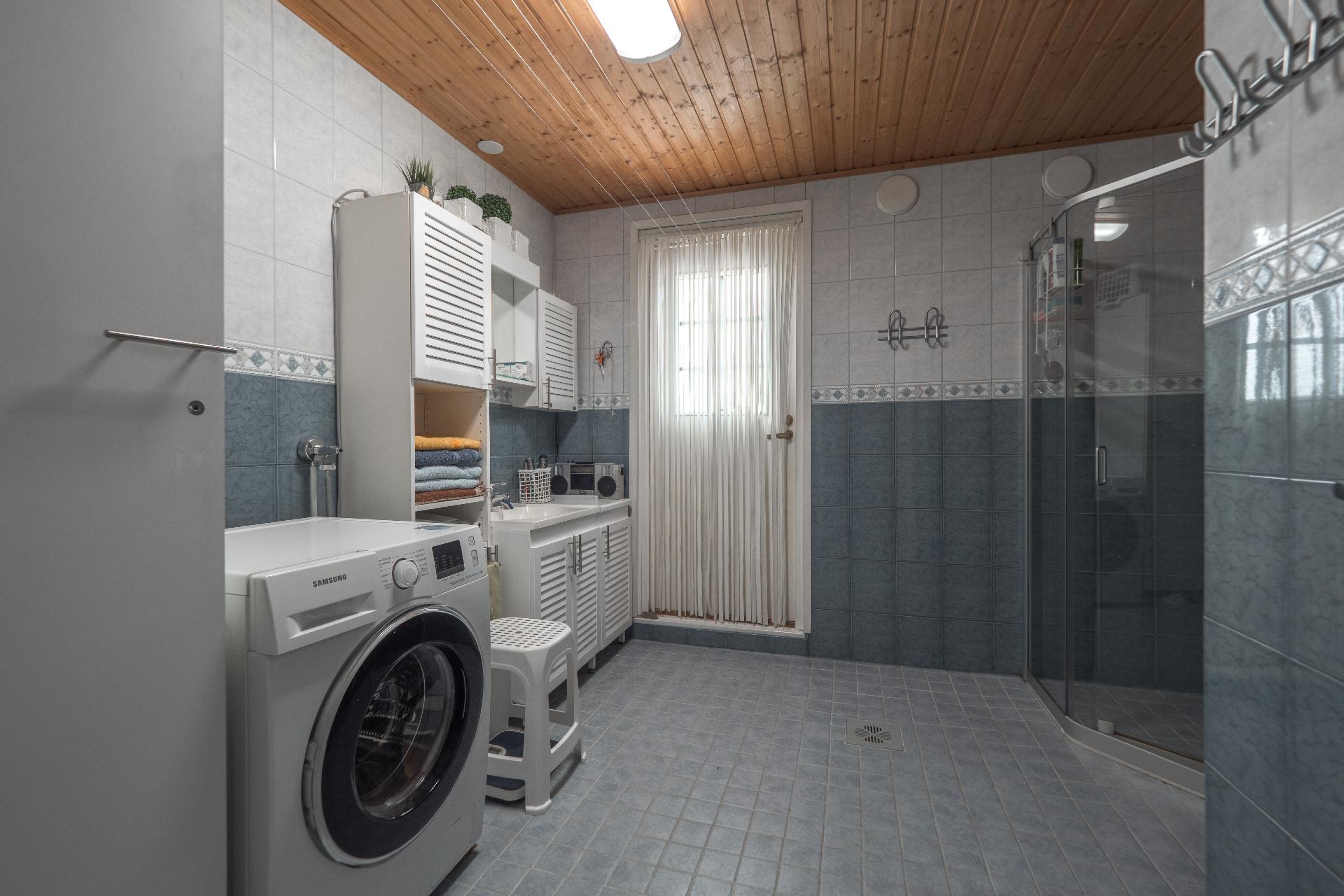 Kylpytiloihin sopii hyvin pyykinhuoltokin