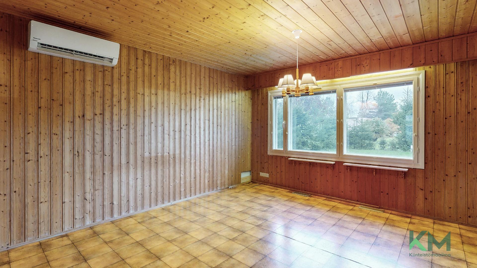 Olohuoneessa ilmalämpöpumppu