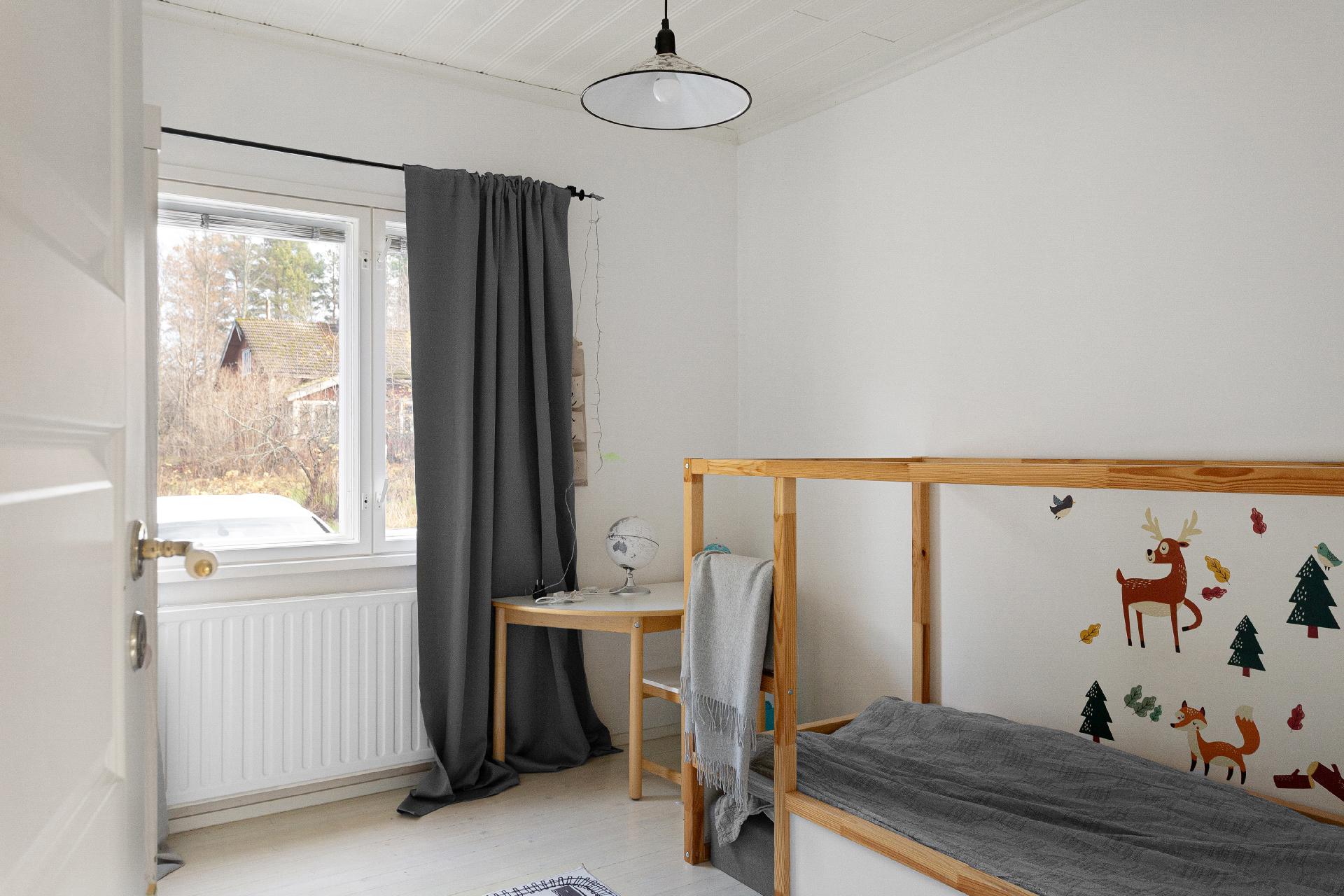 Alakerran makuuhuone