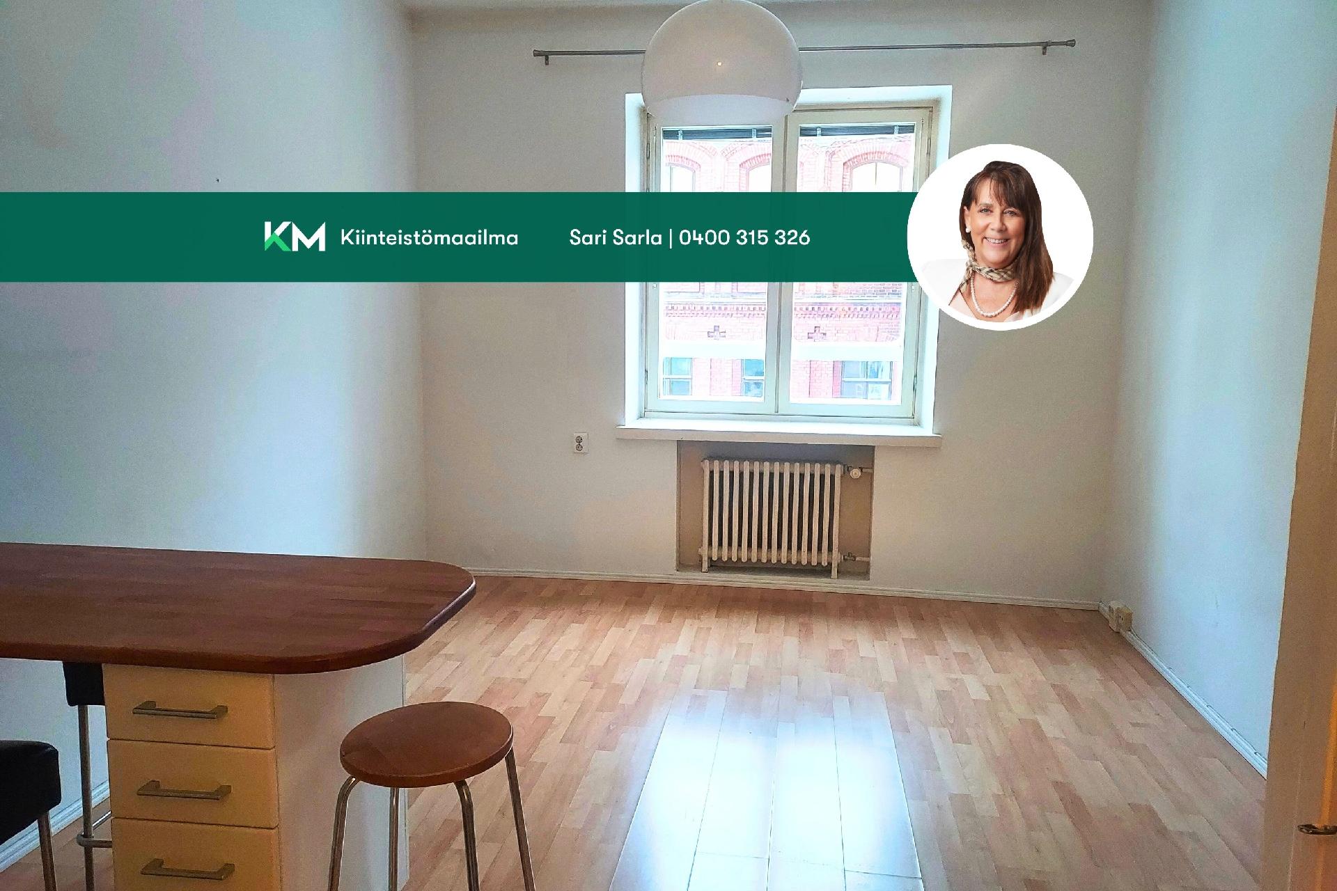 Avokeittiö olohuoneen yhteydessä