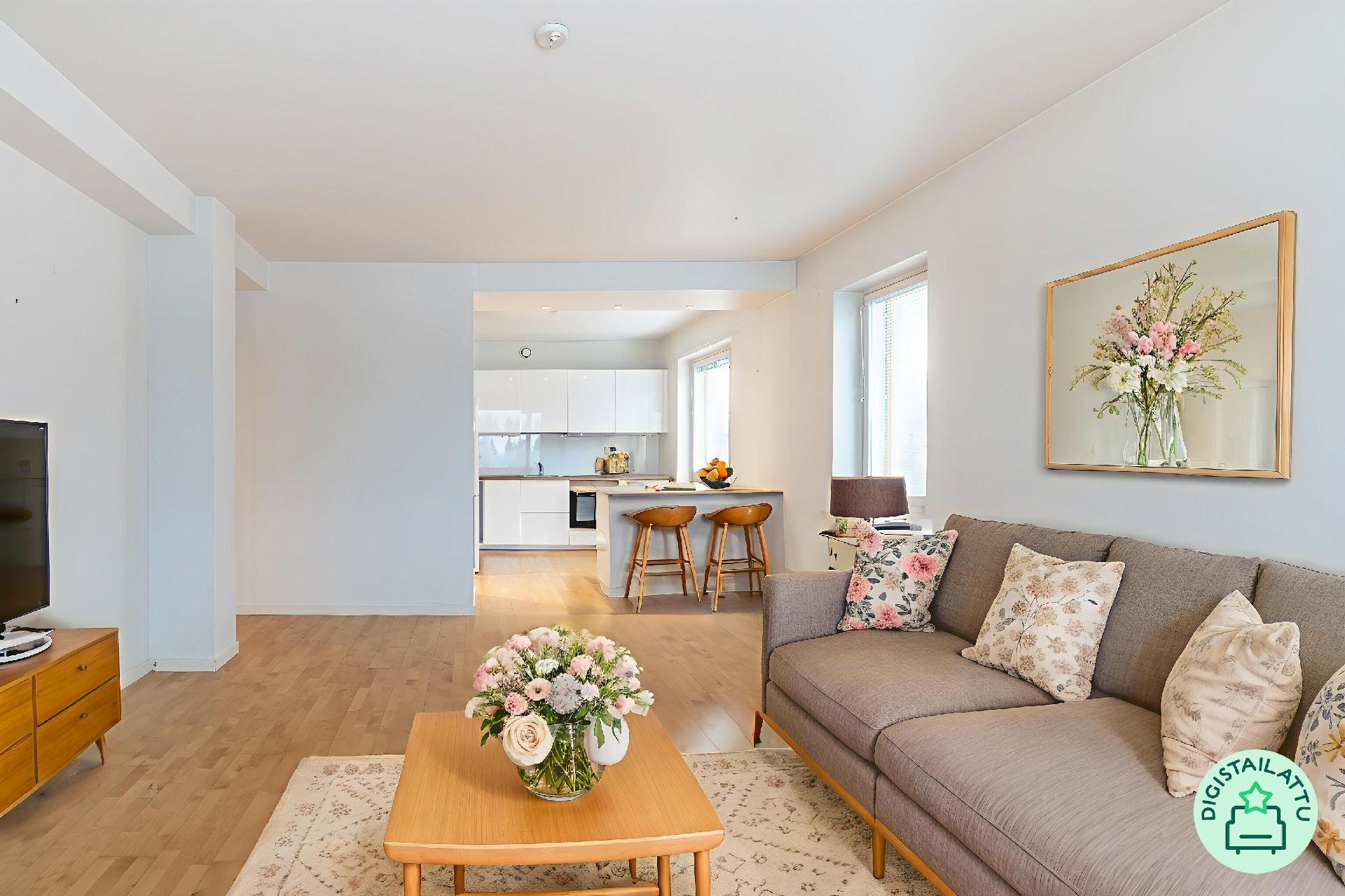 Näkymä olohuoneesta keittiöön päin, digistailattuna.