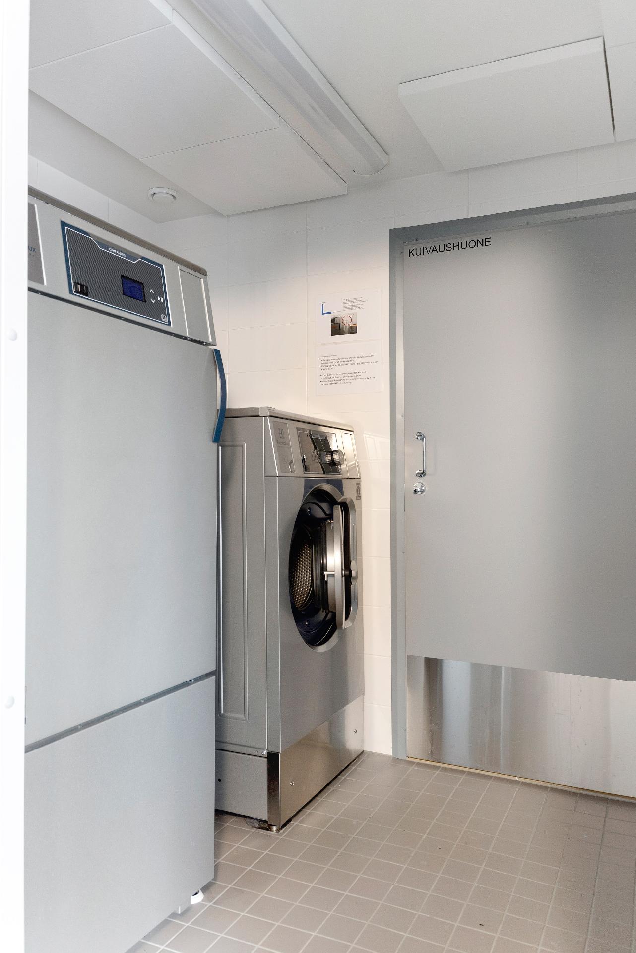 taloyhtiön pesutupa samassa rapussa