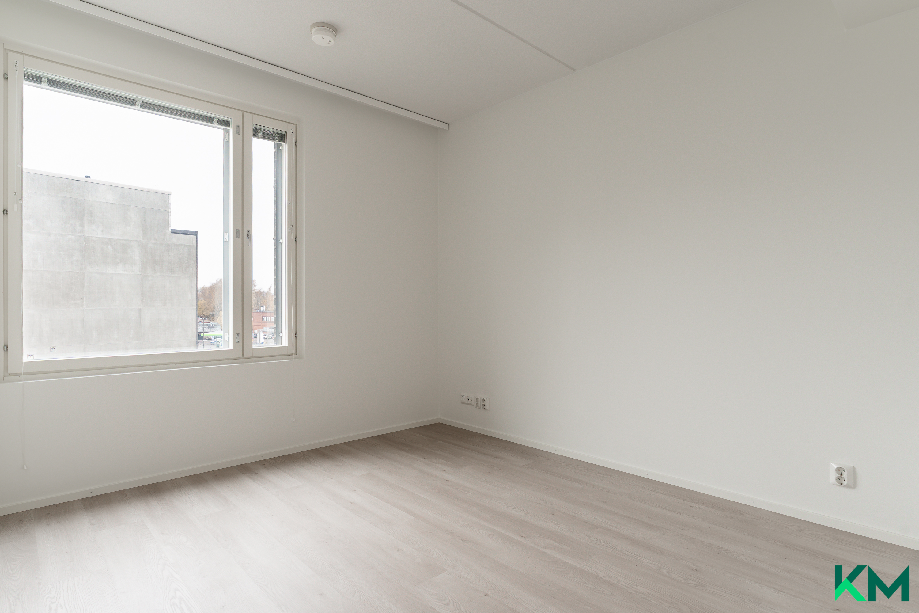 Toinen makuuhuone rauhaisan sisäpihan suuntaan