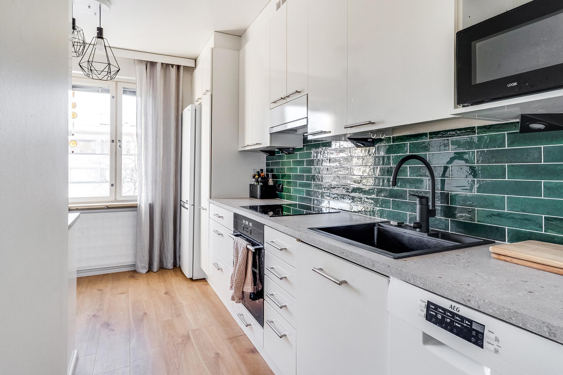 Vuonna 2025 remontoitu tyylikäs keittiö