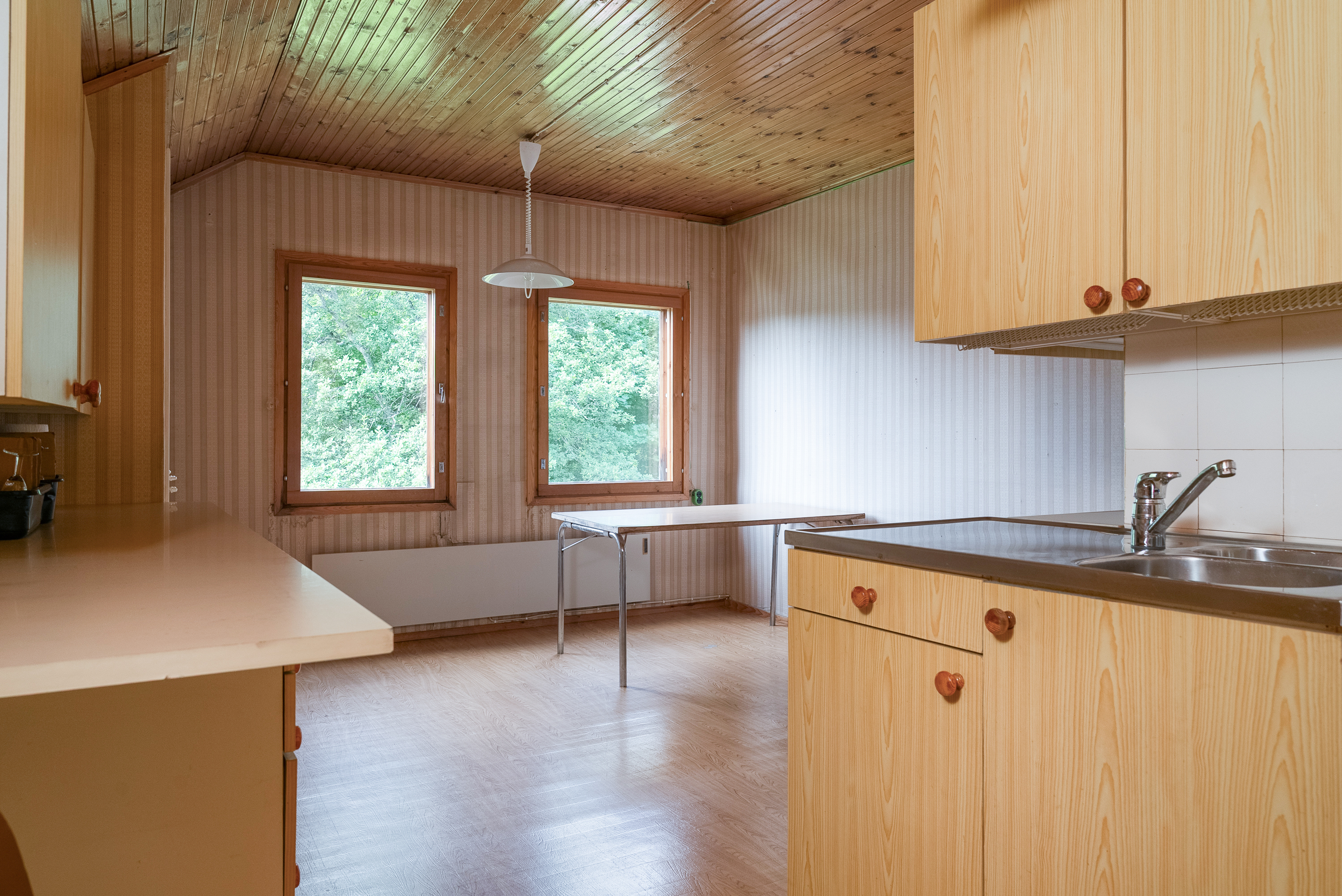 Yläkerran keittiö, josta saa makuuhuoneen