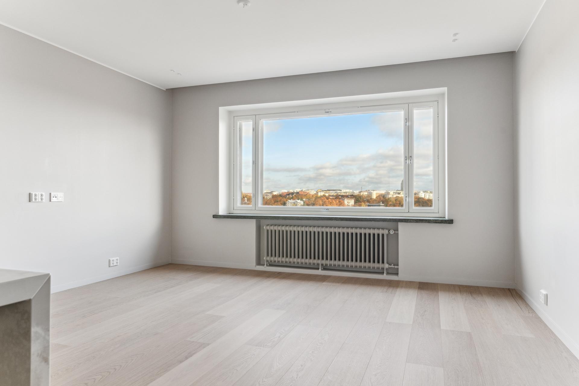 Olohuoneen maisemat Töölönlahdelle ovat kuin taulusta