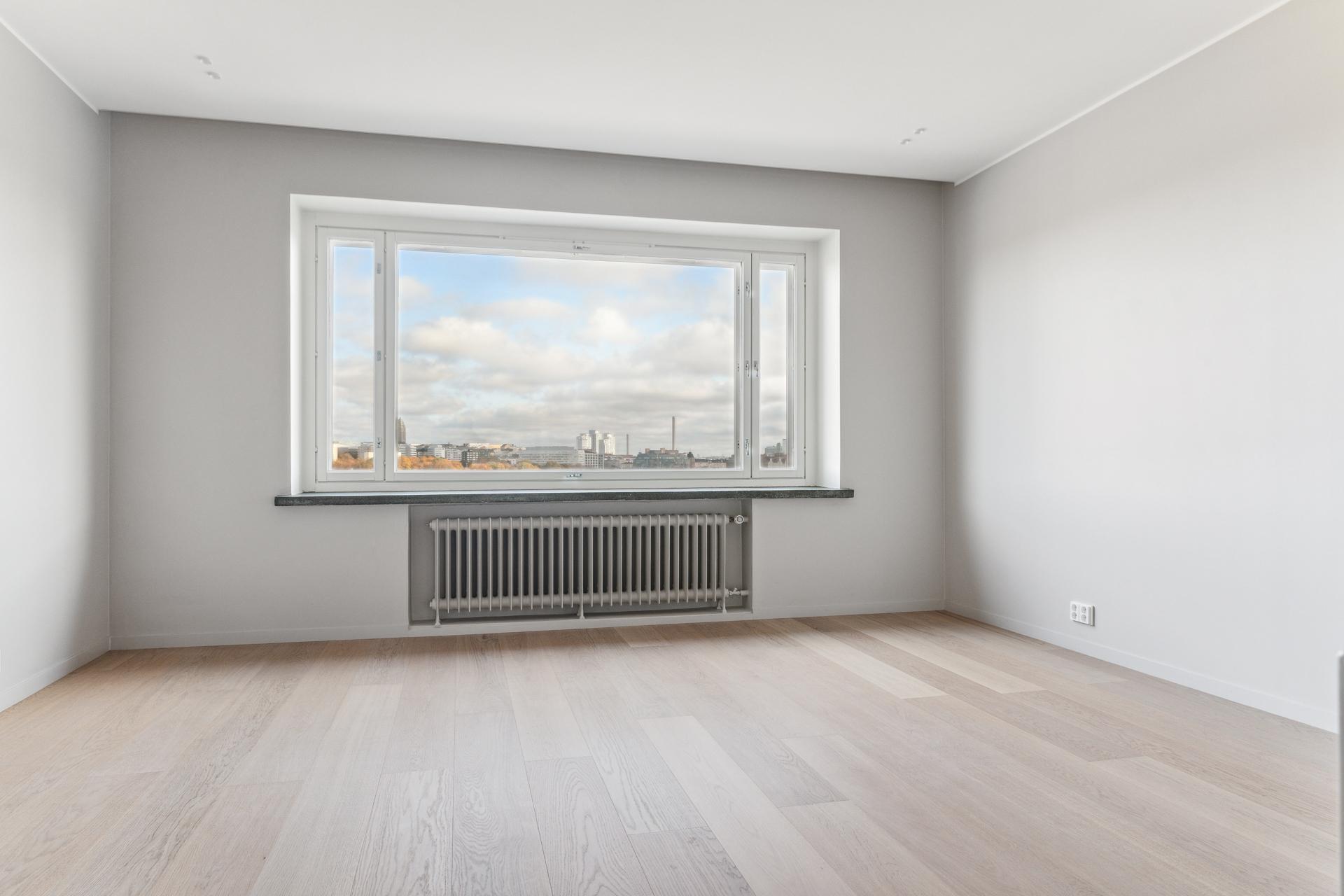 Olohuoneen maisemat Töölönlahdelle ovat kuin taulusta