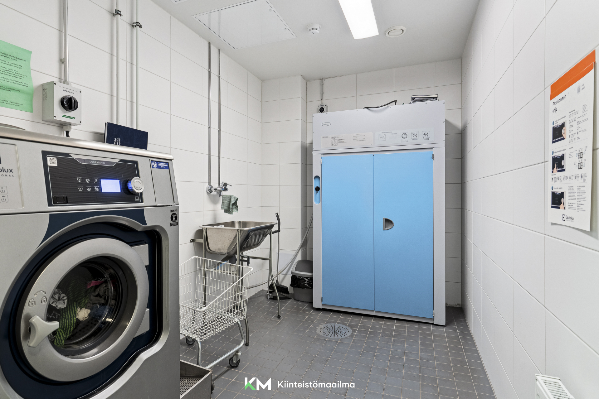 Taloyhtiön maksuton pesutupa.