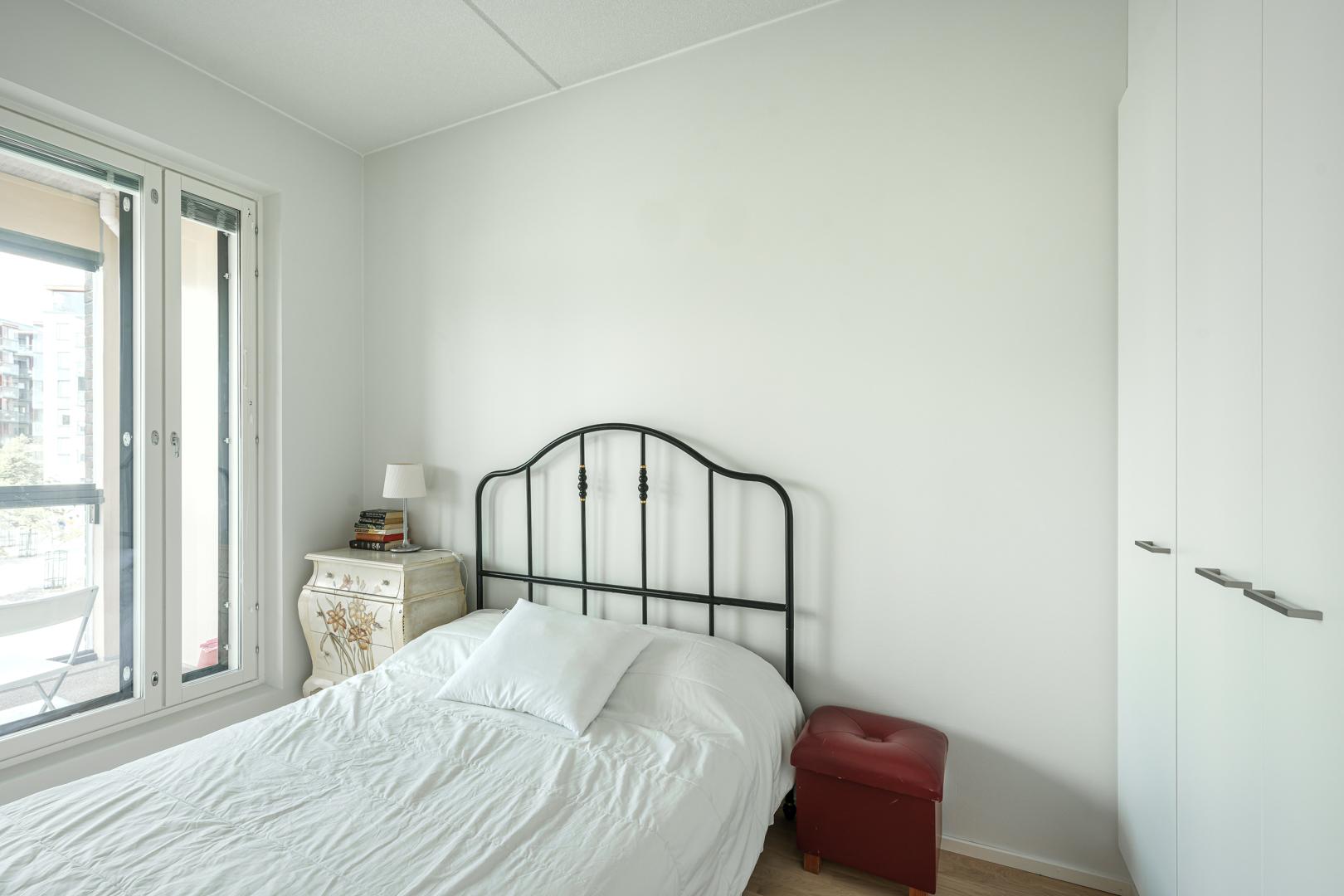 Pieni, mutta toimiva makuuhuone