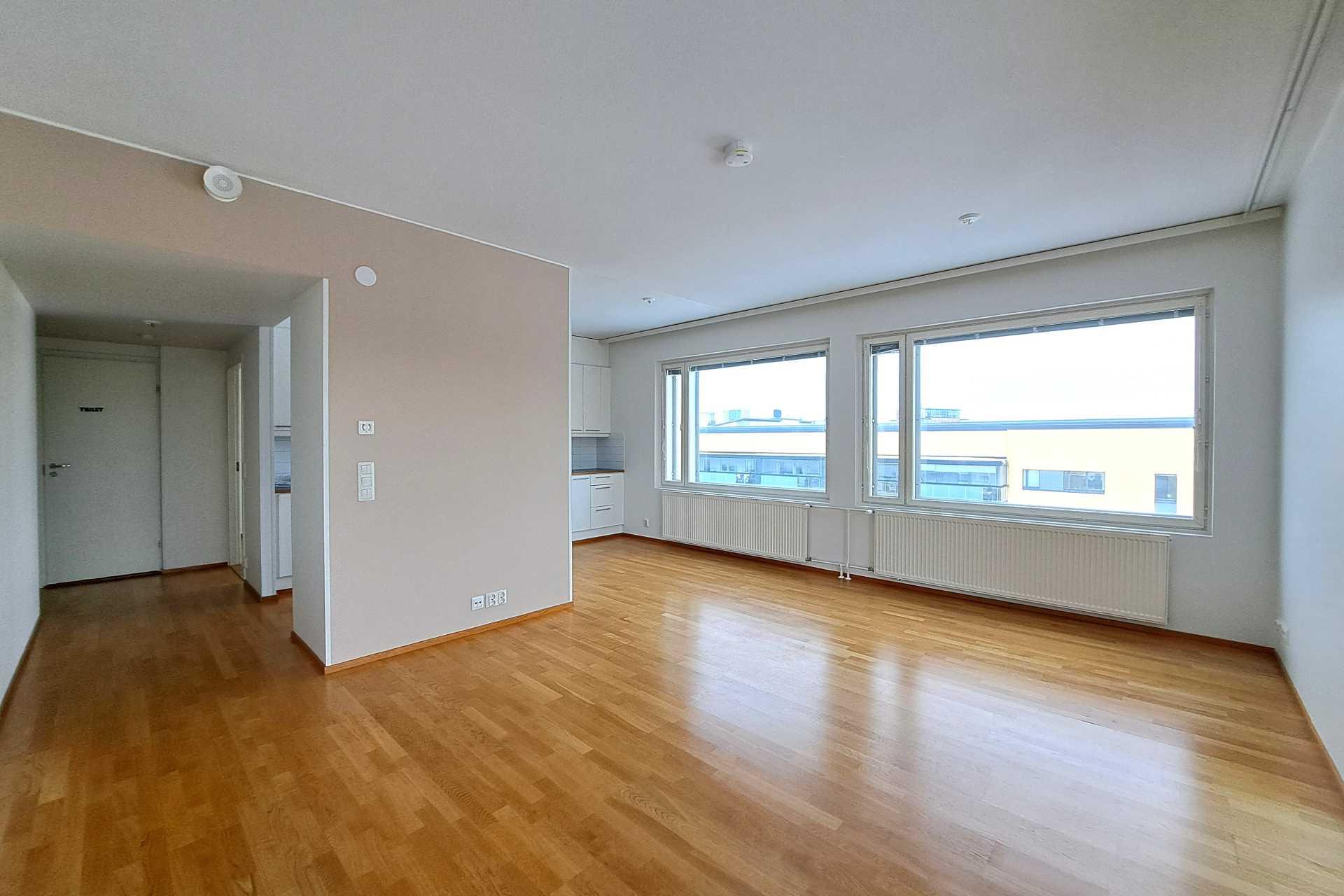 olohuonetta näkymää eteiseen ja mh1