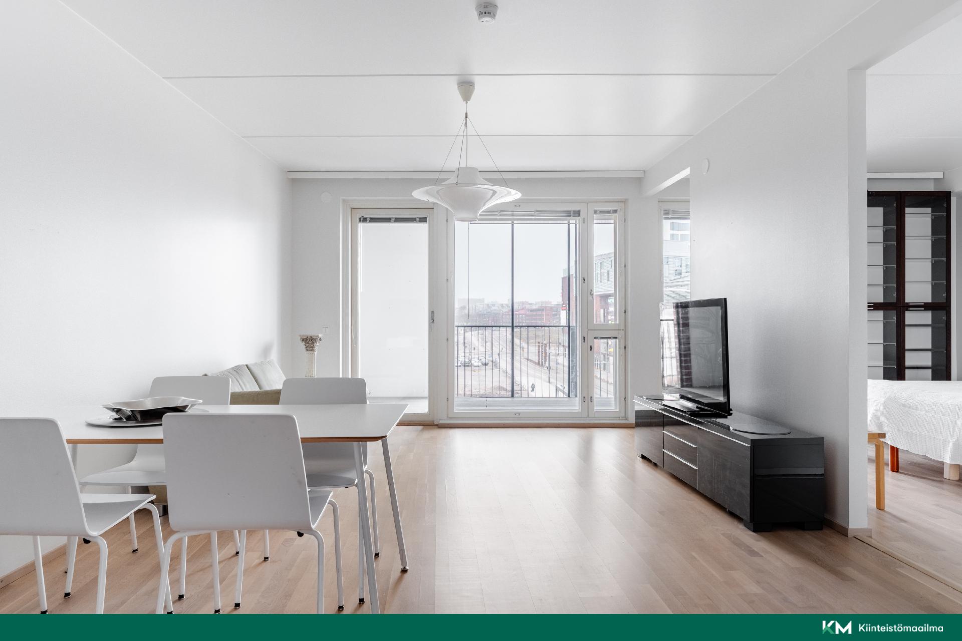 Tilava, avara ja valoisa olohuone