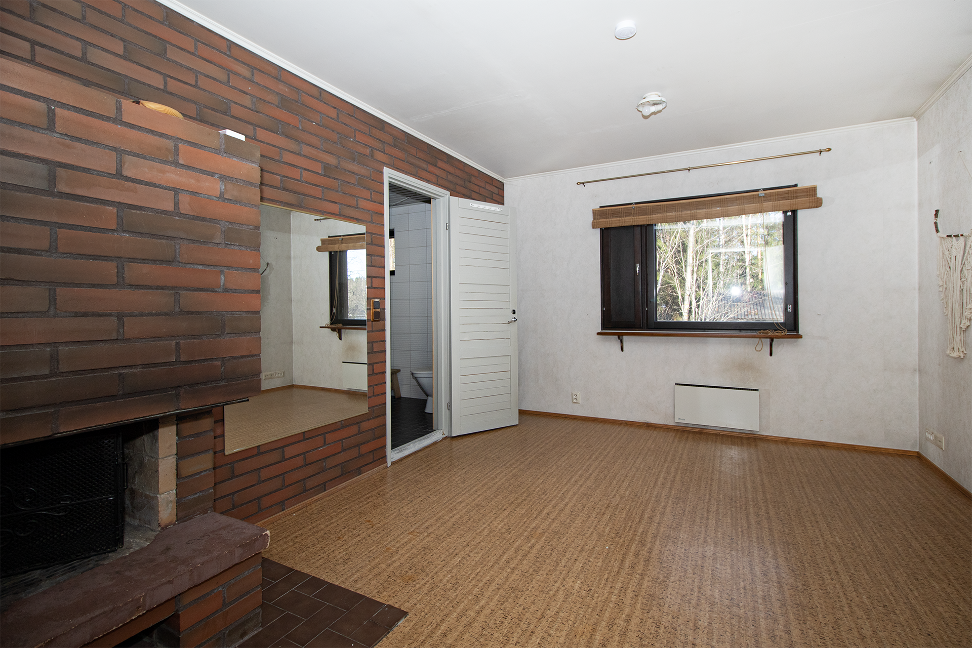 Takkahuone jossa tunnelman luojana avo-takka