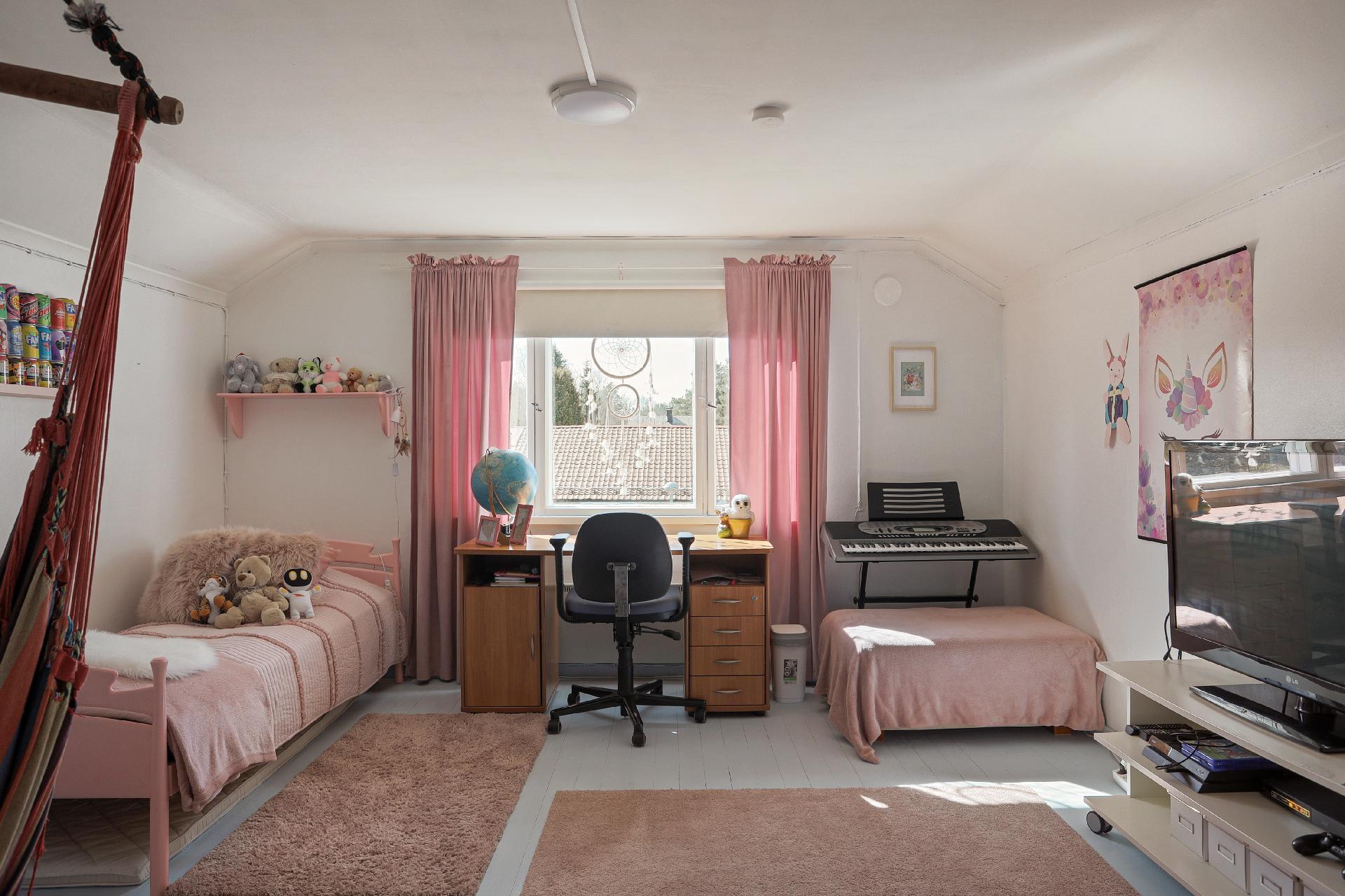 Yläkerran makuuhuine