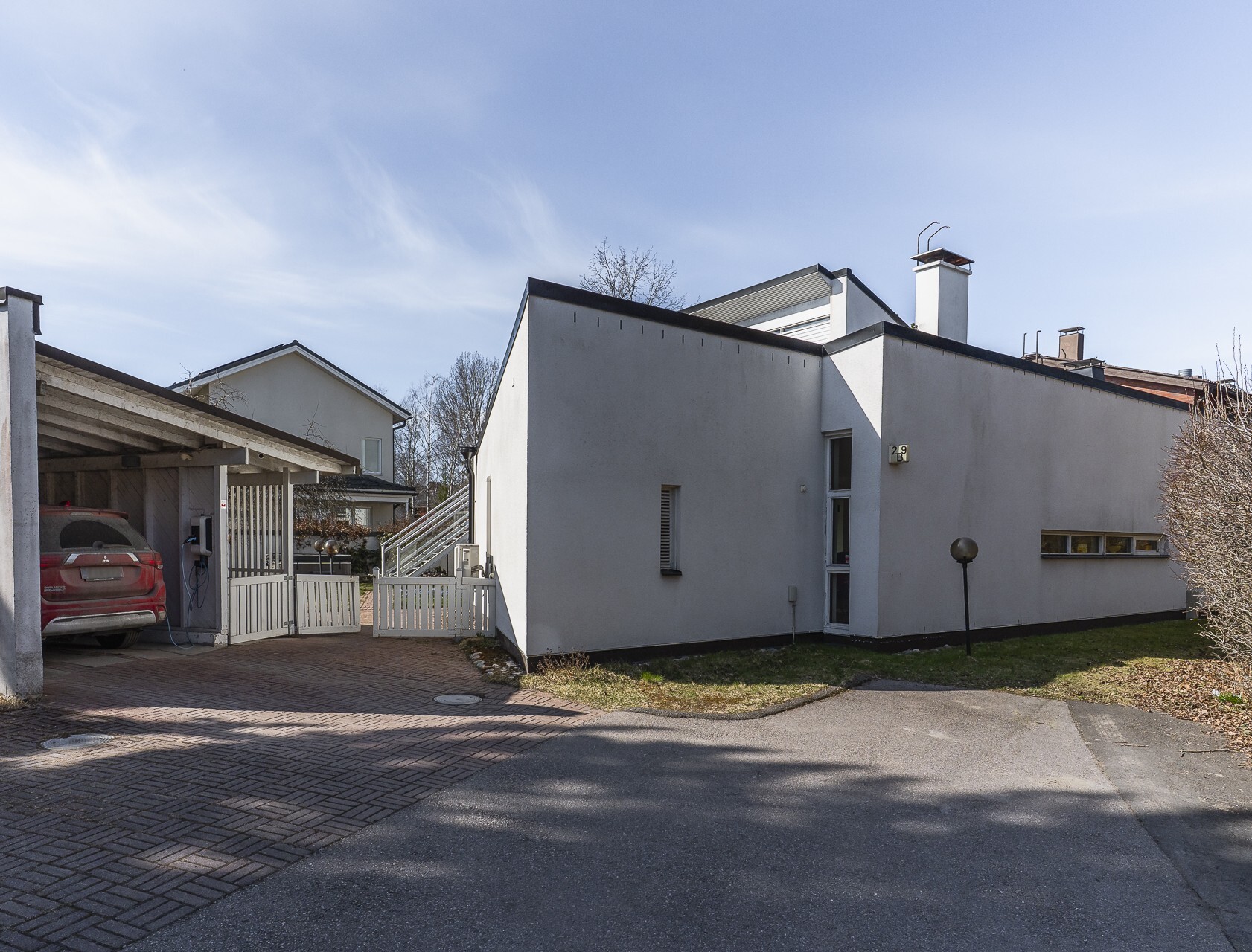 Autokatos ja parkkipaikka