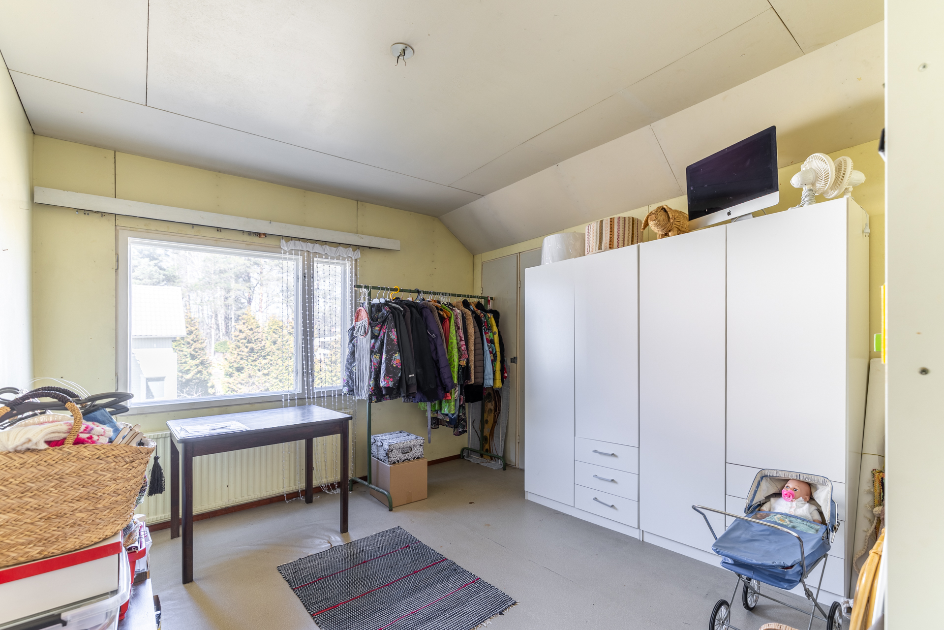 Yläkerran makuuhuonetta