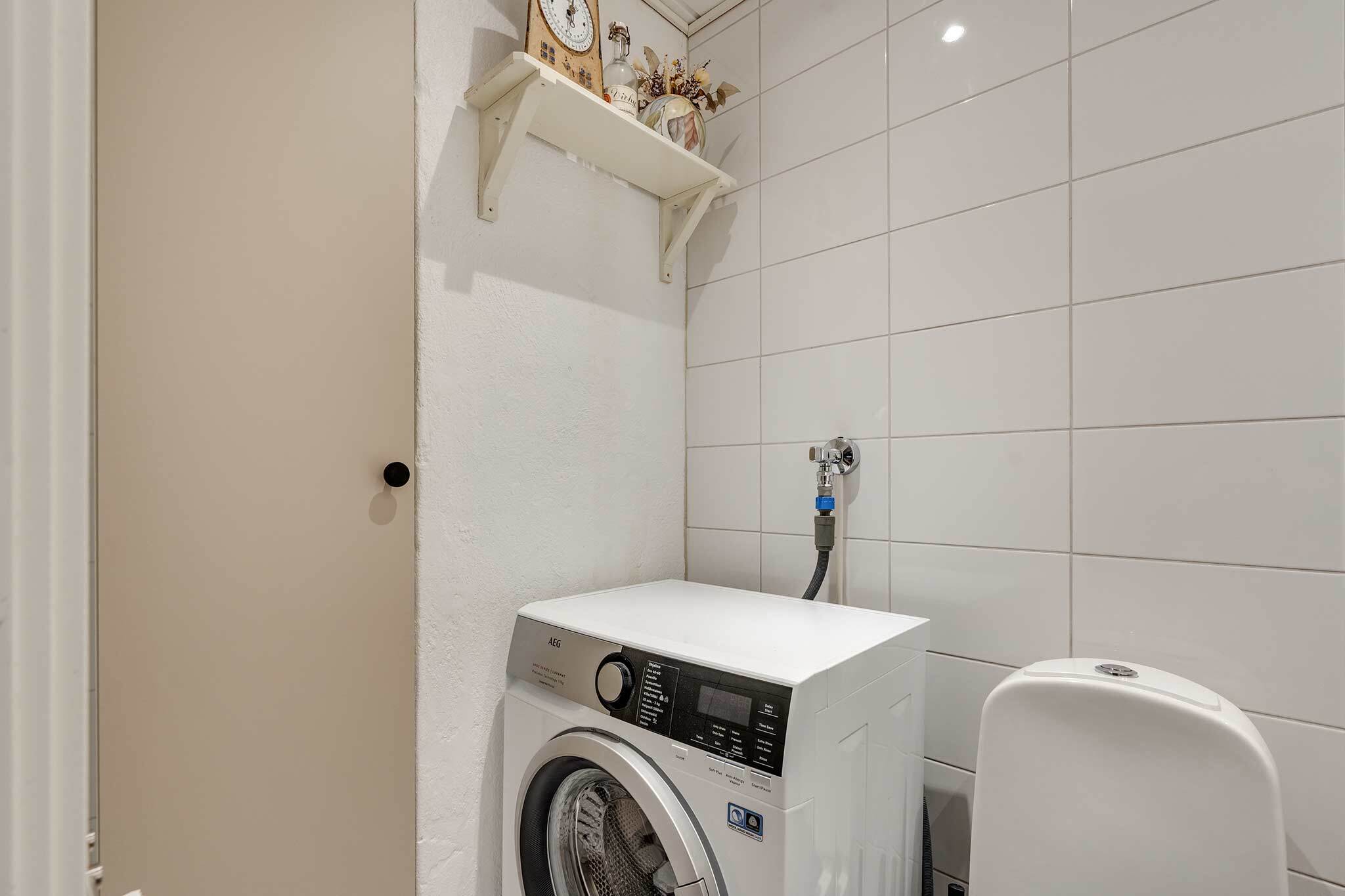 Paikka pyykinpesukoneelle